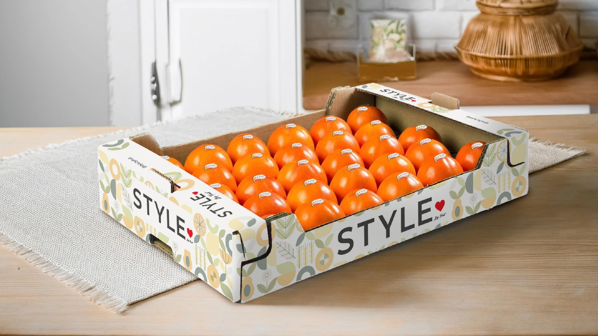 A Style by Fruit tray of premium kaki, wrapped in the Mediterranean-pattern packaging