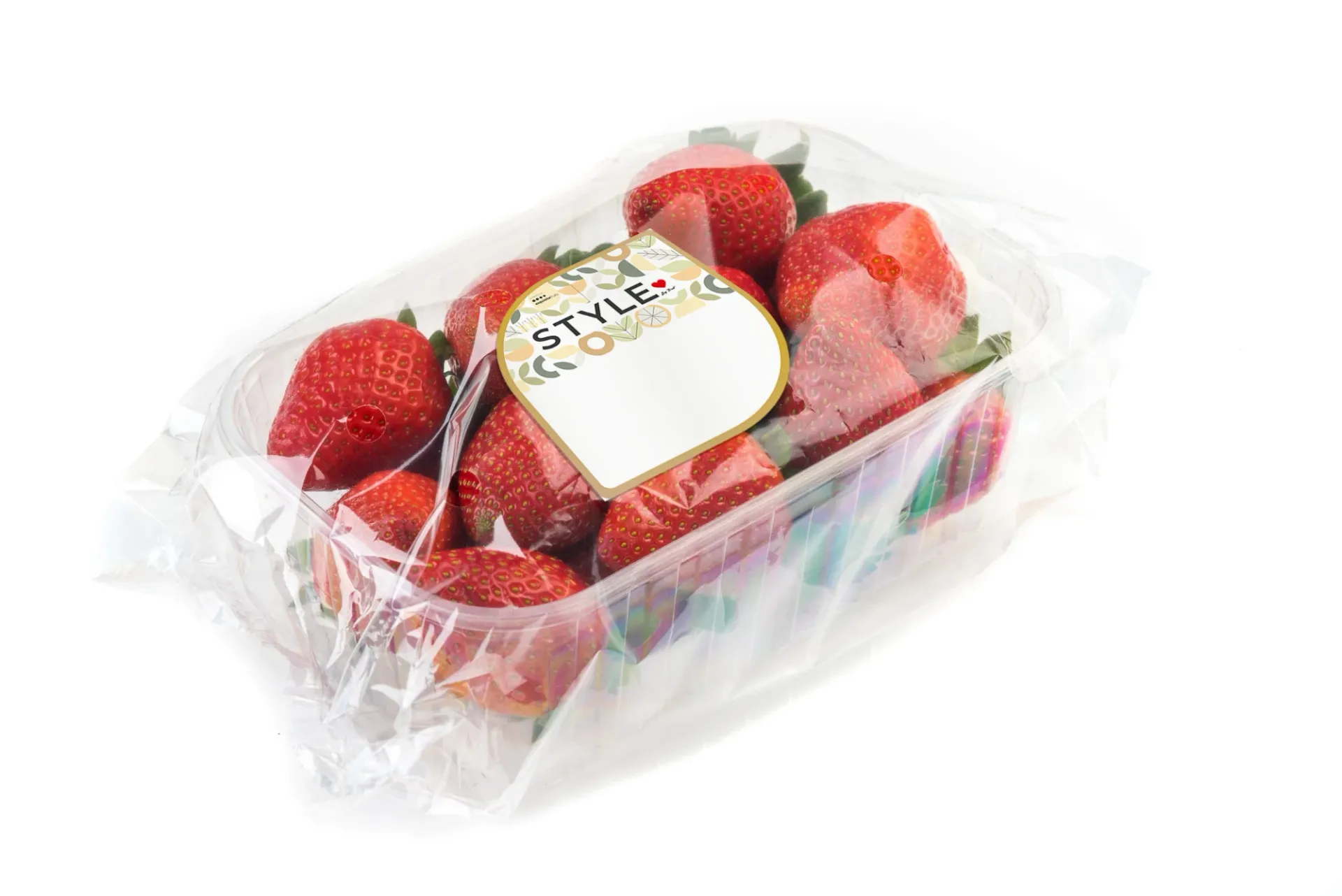A Style by Fruit strawberry punnet with the branded label